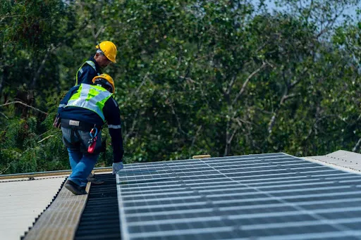 Solar Installation in Tampa Bay: 2026 Complete Guide Modern casement window replacement overlooking the ocean at sunset, highlighting improved insulation and sealing.